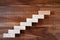 Wooden block stacking as step staircase. Business concept for growth successful. Blank for copy text