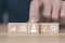 Wooden blocks showing a rocket icon Startup business concept Entrepreneurship and online digital business network connection on