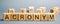 Wooden blocks with the word Acronym. Abbreviation from the initial components of a phrase or a word