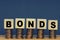 Wooden blocks with the word Bonds. Equivalent loan