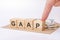 wooden blocks with word GAAP. Generally Accepted Accounting Principles