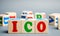 Wooden blocks with the word ICO  Initial coin offering . Attracting investments in the form of selling to investors a fixed