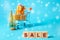 Wooden blocks with the word Sale, Christmas tree and boxes in a supermarket trolley. New Year Sale and Promotions Concept.