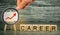 Wooden blocks with the words Career and the up arrow. personal and career growth, self-development, success, progress and