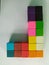 Wooden blog square grid.Sticks to painted colorful to array different levels to create dimensions for decorated on the wall in tha