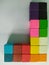 Wooden blog square grid.Sticks to painted colorful to array different levels to create dimensions for decorated on the wall in tha