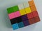 Wooden blog square grid.Sticks to painted colorful to array different levels to create dimensions for decorated on the wall in tha