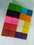 Wooden blog square grid.Sticks to painted colorful to array different levels to create dimensions for decorated on the wall in tha