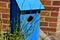 Wooden blue outdoor birdhouse