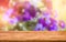 Wooden Board on Empty Blurred Garden with Florals
