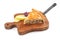 Wooden board with piece of apple pie and shovel on white background