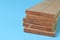 Wooden board planks isolated on a blue background
