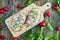 Wooden Board with Two Slices of Bread with Curd Cheese, Radishes