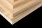 Wooden boards on black in a woodworking industry. stacks with pine lumber. folded edge board. timber for construction