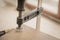 Wooden boards clamped together in the furniture assembly workshop