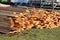 Wooden boards lie in the backyard