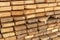 Wooden boards in stack. Construction material. Close-up
