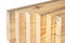 Wooden boards on white in a woodworking industry. stacks with pine lumber. folded edge board. timber for construction