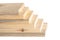 Wooden boards on white in a woodworking industry. stacks with pine lumber. folded edge board. timber for construction