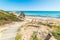 Wooden boardwalk by the beach in Scoglio di Peppino shore