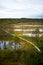 Wooden boardwalk through forest and swamp - Viru raba in estonia