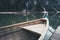 Wooden boat at the alpine mountain lake