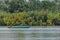 Wooden boat cruising Berau river, Borneo