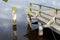 Wooden boat dock surrounded by smooth water at the touristic North Sea shore