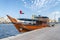 Wooden boat docked along Dubai Creek, UAE