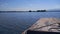 Wooden boat head is floating on traveling in a still water lake in slow motion