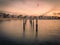 Wooden boat moorings at sunrise in New England