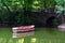 Wooden boat in the park, free space.