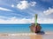 Wooden boat on pristine beach, nature background