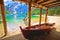 Wooden boat under boats house on Braies lake in alpine landscape