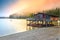 Wooden boathouse with boats on the alpine lake, Dolomites, Italy