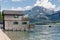 Wooden boathouse in Sankt Wolfgang am Wolfgangsee surrounded by alps