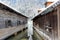 Wooden boathouses on a lake in the Bavarian alps