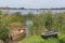 Wooden boats, old fishing vessels on the coast of tranquil lake, sustainable ecological tourism in Europe