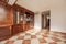 Wooden bookcase with radiator cover, drawers and doors with mirror interior inside the cabinets with glass shelves and stoneware