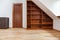 Wooden bookshelf in the attic