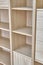 Wooden bookshelves. Wooden bookcases and wall panels made of oak veneered MDF