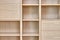 Wooden bookshelves. Wooden bookcases and wall panels made of oak veneered MDF