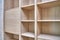 Wooden bookshelves. Wooden bookcases and wall panels made of oak veneered MDF