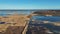 Wooden Bords Trail Through the Kaniera Lake Reeds Aerial Spring Shot Lapmezciems, Latvia.