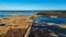 Wooden Bords Trail Through the Kaniera Lake Reeds Aerial Spring Shot Lapmezciems, Latvia.