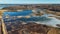 Wooden Bords Trail Through the Kaniera Lake Reeds Aerial Spring Shot Lapmezciems, Latvia.