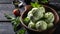 A wooden bowl filled with minty green ice cream