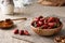 Wooden bowl with fresh stawberries