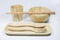 Wooden bowl and glass and spoon and fork and chopsticks and dish