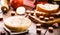 Wooden bowl with lard, pork fat used as a brazilian cooking ingredient, bacon and pork sausage in the background